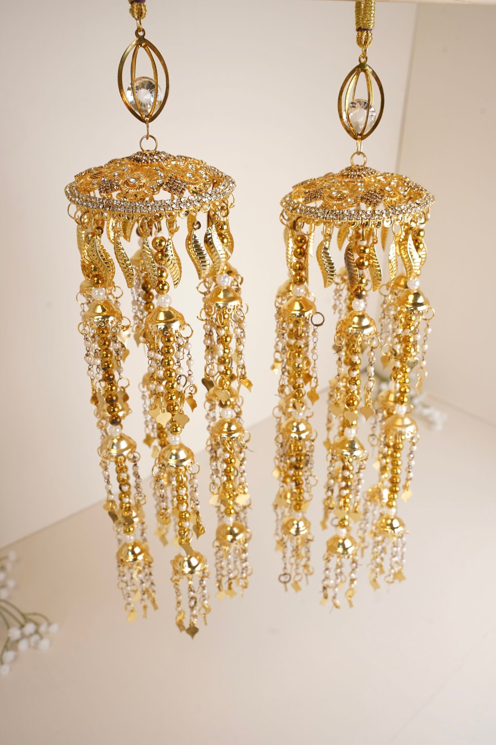 Delicate traditional gold kaleerey with pearl and leaf detailing