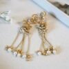 Long Kashmiri earrings with intricate traditional design, perfect for weddings, bridal events, and festive occasions