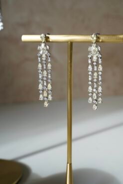 Delicate American diamond necklace set with matching earrings, featuring sparkling stones in a soft feminine design