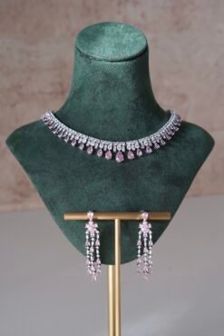 Delicate pink American diamond necklace set with matching earrings, featuring sparkling stones in a soft feminine design