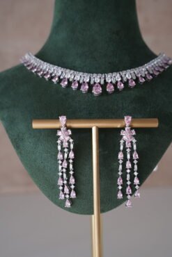 Delicate pink American diamond necklace set with matching earrings, featuring sparkling stones in a soft feminine design