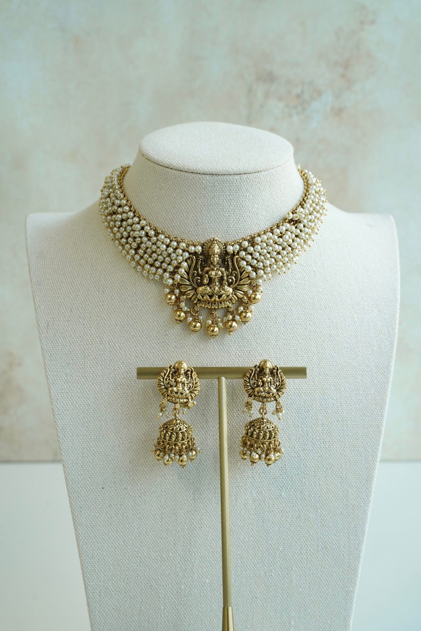 Padma temple necklace set with pearls and goddess motif, South Asian bridal jewelry