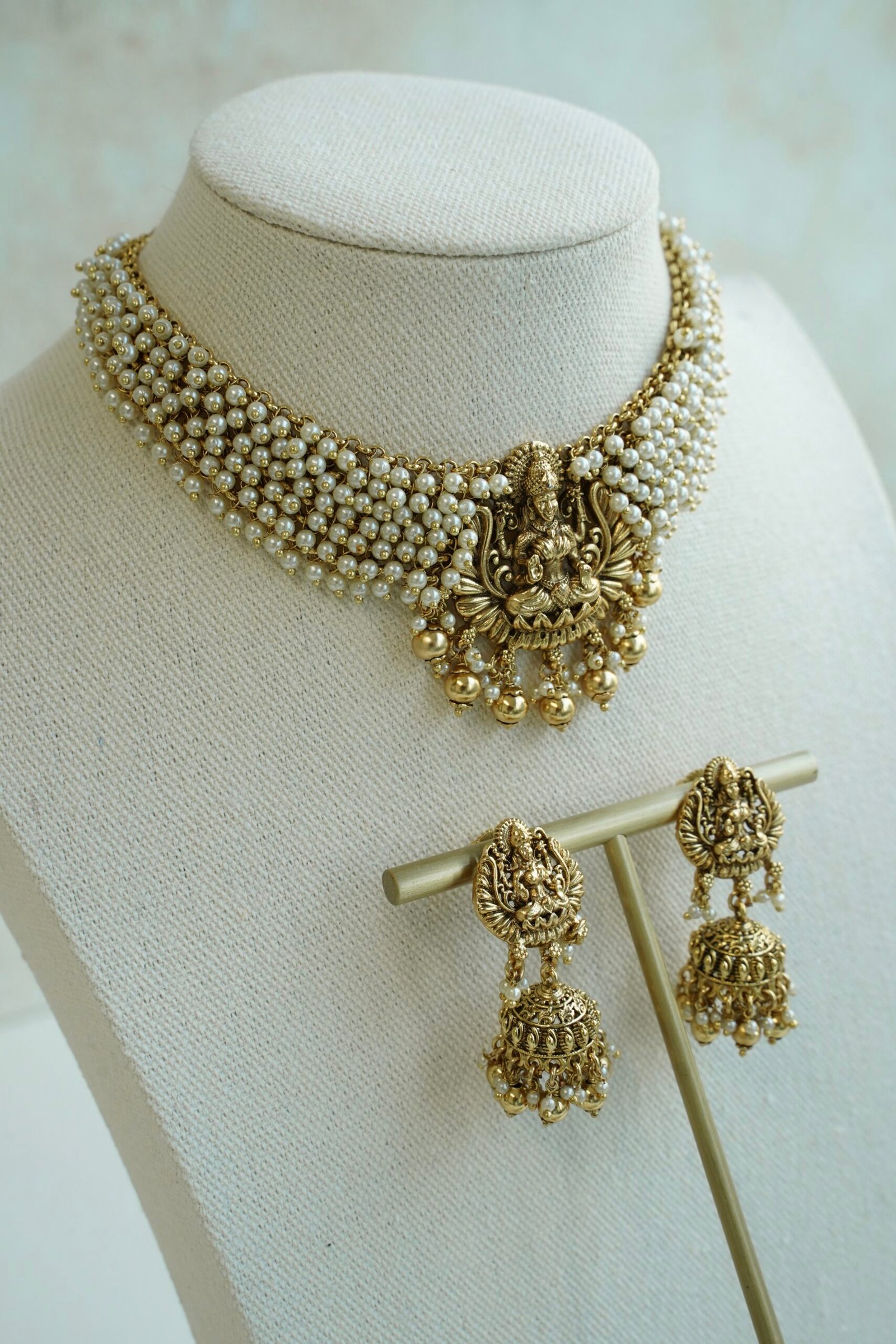 Padma temple necklace set with pearls and goddess motif, South Asian bridal jewelry