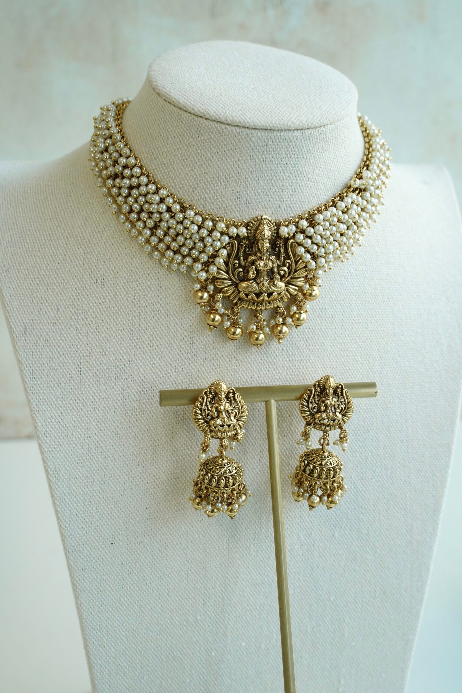 Padma temple necklace set with pearls and goddess motif, South Asian bridal jewelry