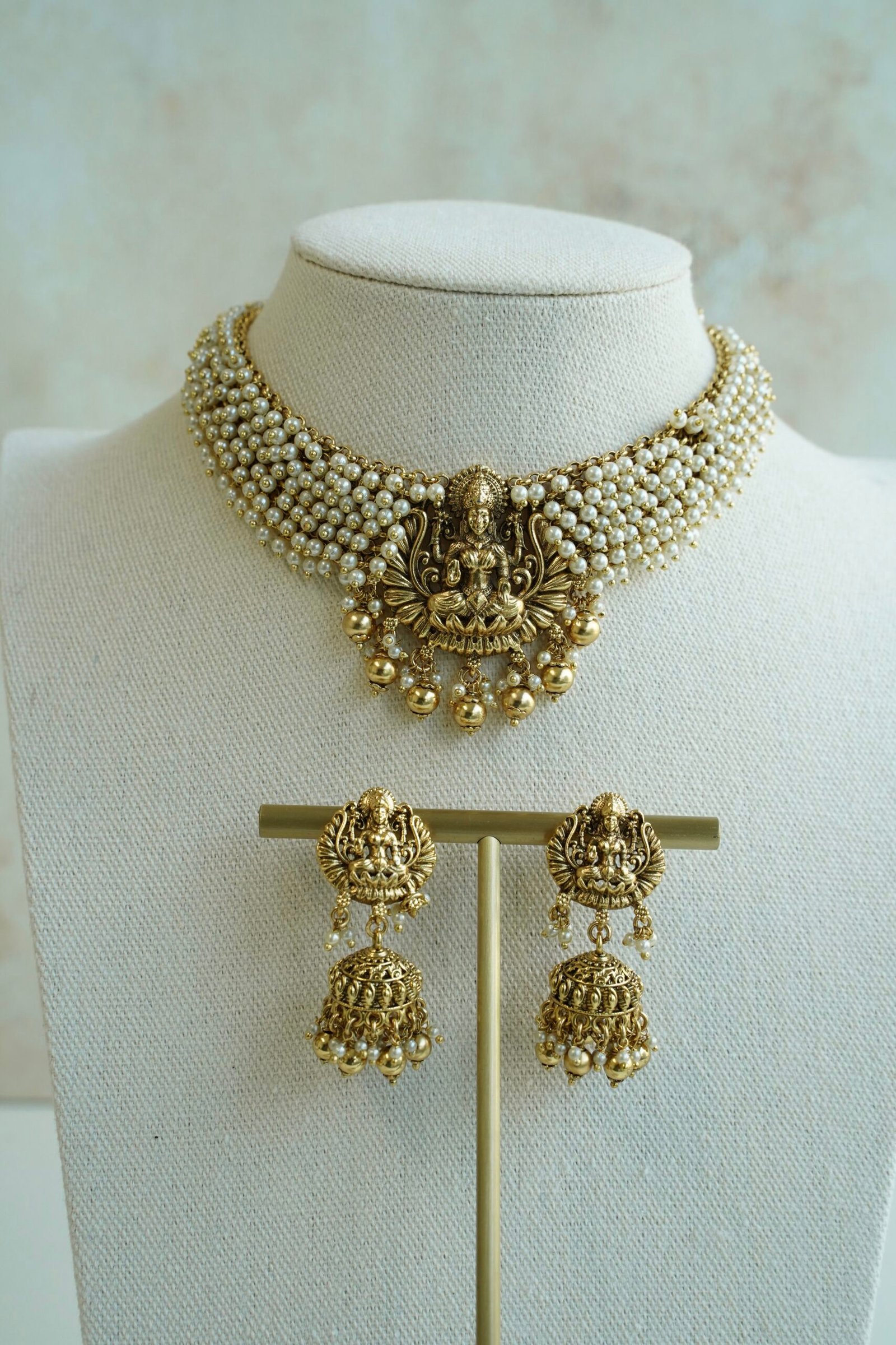 Padma temple necklace set with pearls and goddess motif, South Asian bridal jewelry