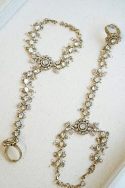 traditional Pakistani and Indian style Kundan hathphool bracelet with adjustable finger rings, styled for a luxury South Asian wedding