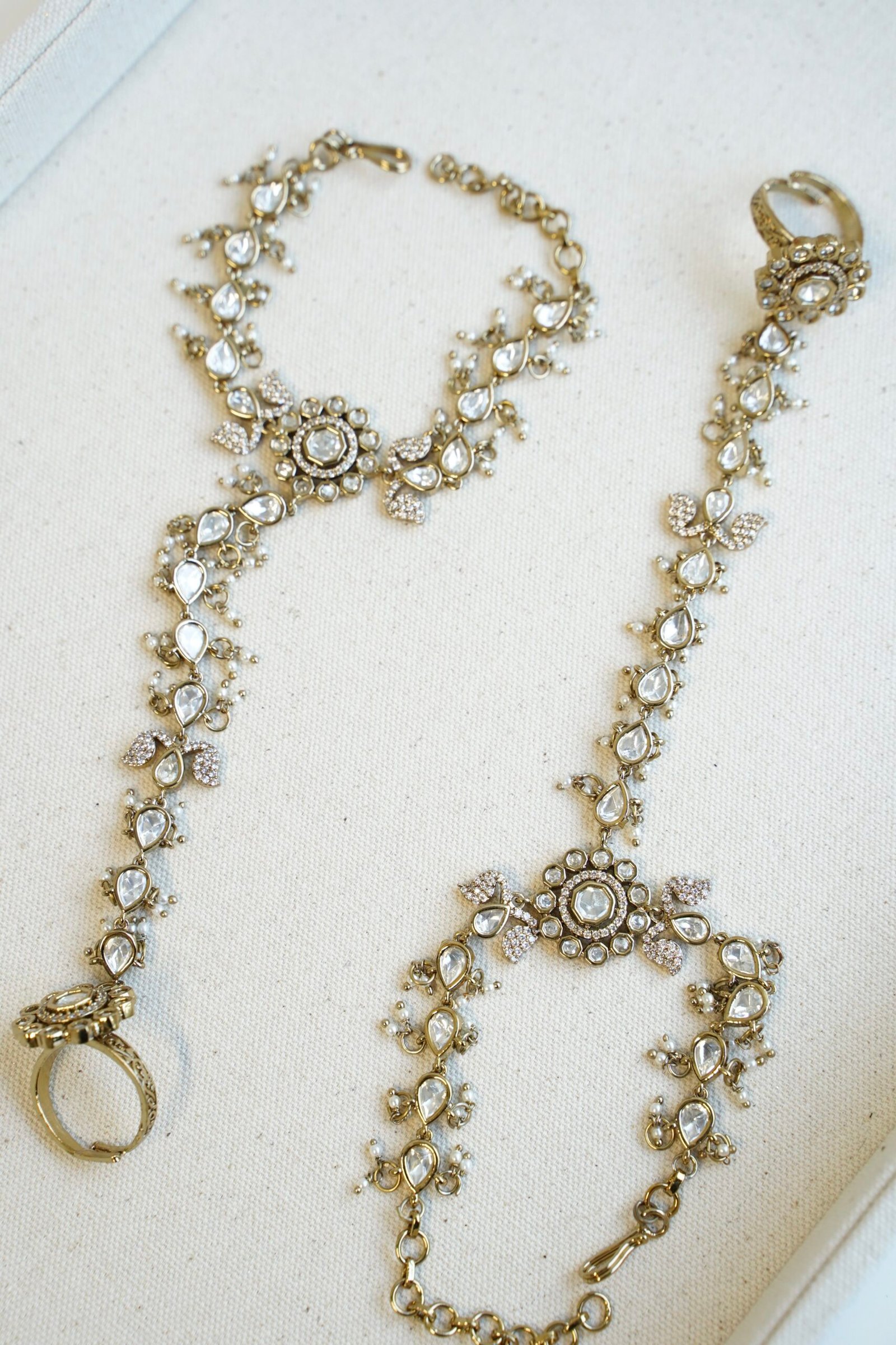 traditional Pakistani and Indian style Kundan hathphool bracelet with adjustable finger rings, styled for a luxury South Asian wedding