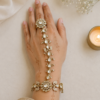 traditional Pakistani and Indian style Kundan hathphool bracelet with adjustable finger rings, styled for a luxury South Asian wedding