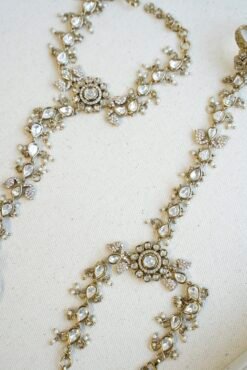 traditional Pakistani and Indian style Kundan hathphool bracelet with adjustable finger rings, styled for a luxury South Asian wedding