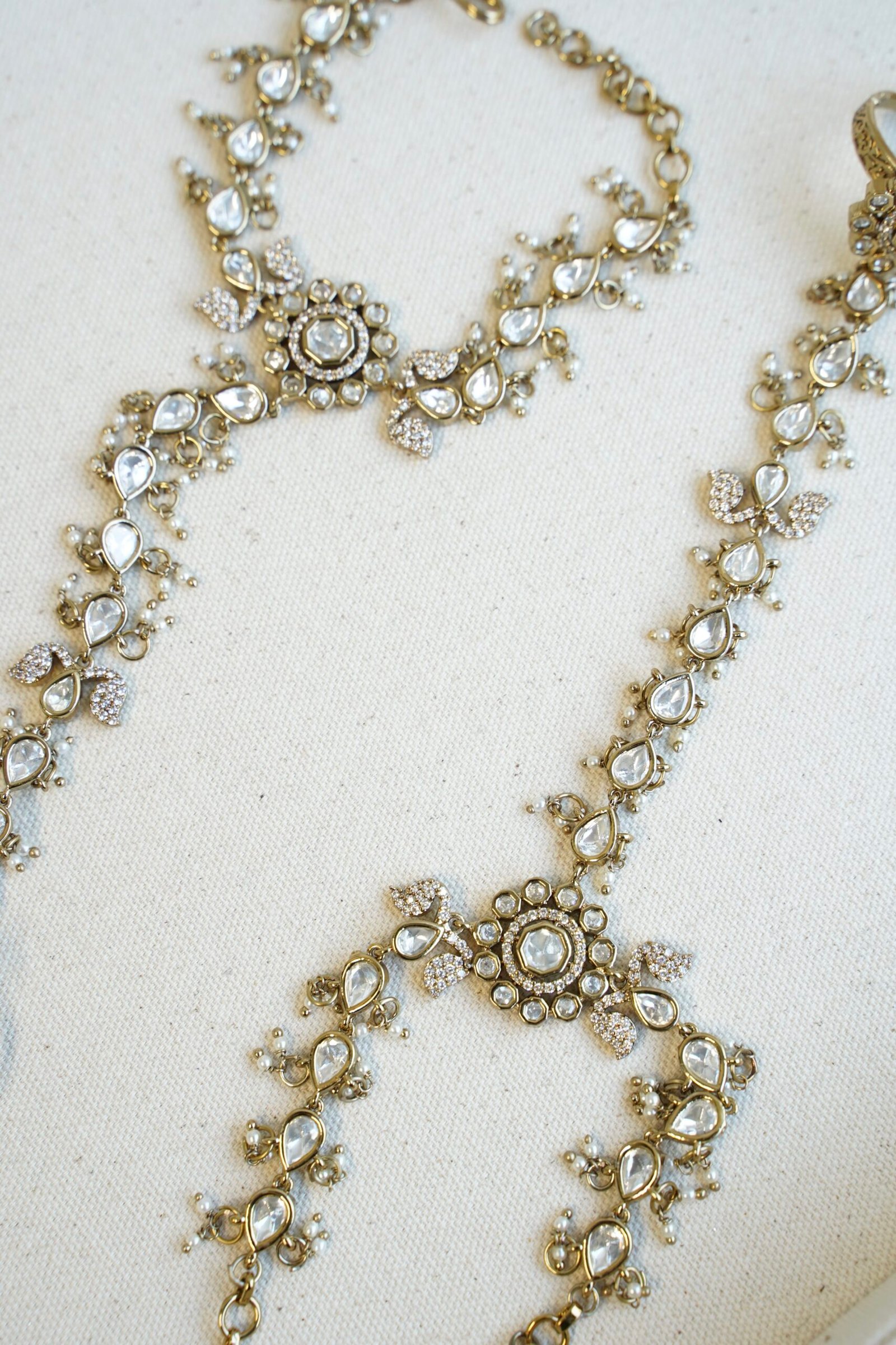 traditional Pakistani and Indian style Kundan hathphool bracelet with adjustable finger rings, styled for a luxury South Asian wedding