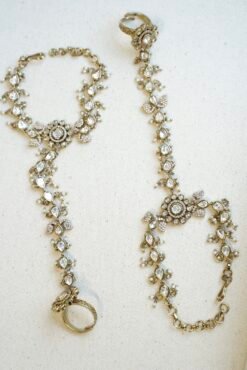 traditional Pakistani and Indian style Kundan hathphool bracelet with adjustable finger rings, styled for a luxury South Asian wedding