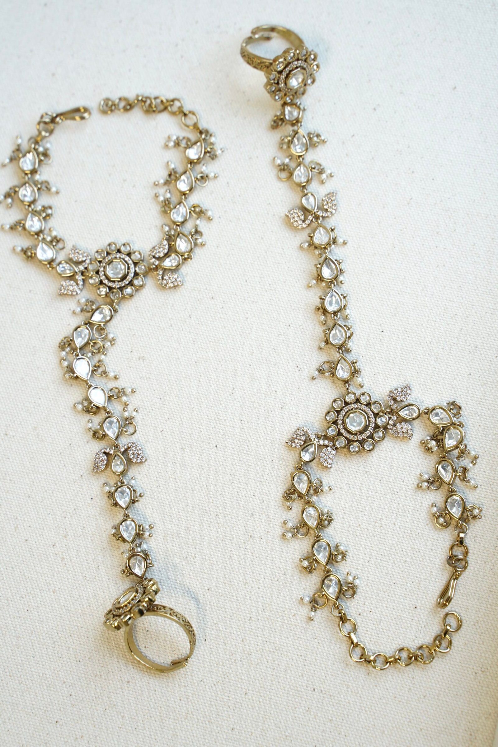 traditional Pakistani and Indian style Kundan hathphool bracelet with adjustable finger rings, styled for a luxury South Asian wedding