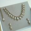 Sophie AD necklace set with antique finish and matching earrings and tikka, South Asian festive jewelry