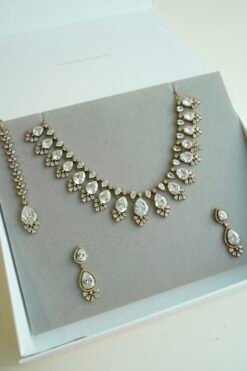 Sophie AD necklace set with antique finish and matching earrings and tikka, South Asian festive jewelry