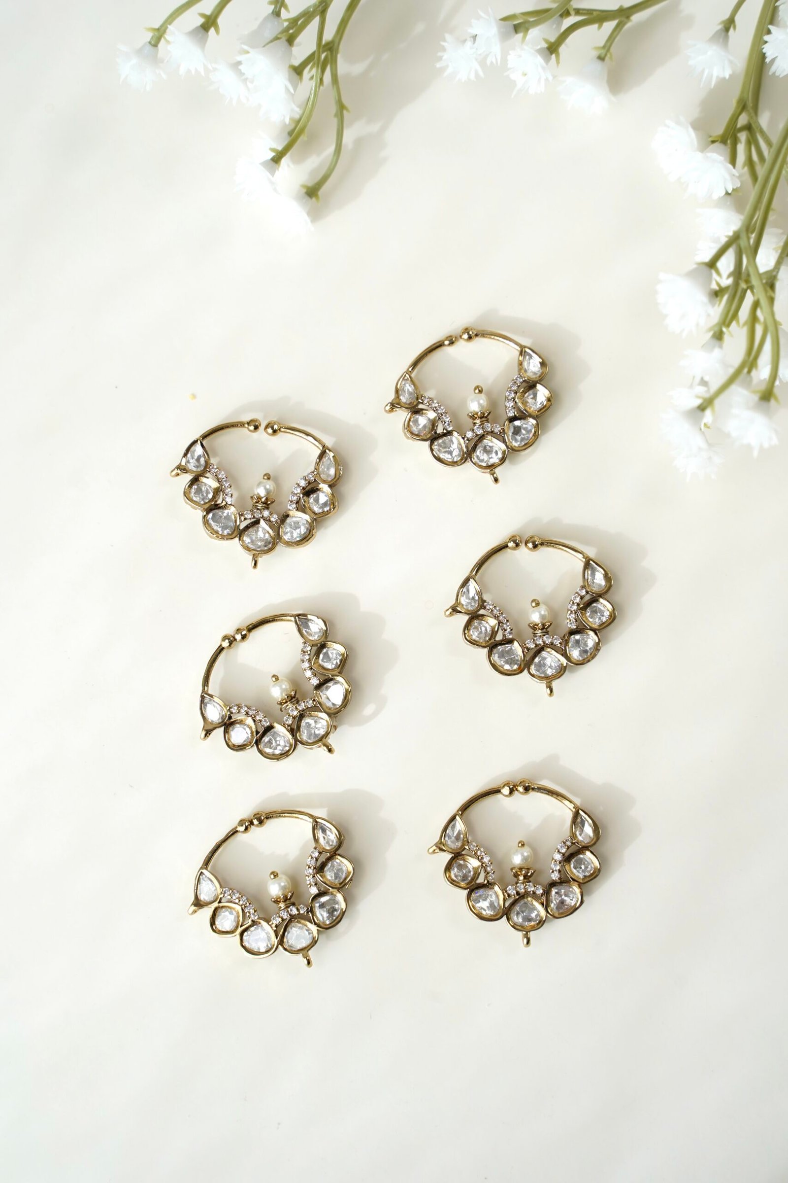 Traditional Kundan nath with a dark antique mehndi finish polish and classic stone detailing by Seyora Jewels.