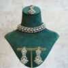 Indian Pakistani necklace set with matching sparkly drop earrings and traditional maang tikka for bridal receptions and festive events.