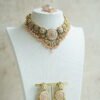 Lightweight pink artificial Kundan necklace set with matching drop earrings and Maang Tikka for South Asian weddings.