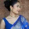 Dainty mini Kundan necklace with an adjustable chain and a pair of matching classic earrings by Seyora Jewels.