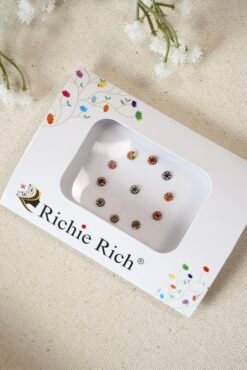 Medium sized multi color bindis with central crystal stone settings.