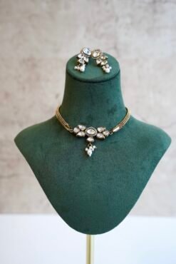 Dainty mini Kundan necklace with an adjustable chain and a pair of matching classic earrings by Seyora Jewels.