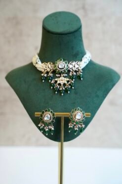 Elegant green beaded choker necklace and matching earrings featuring a lotus Kundan centerpiece by Seyora Jewels.