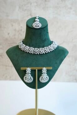 Delicate silver-plated petite stone necklace set with matching sparkly drop earrings and small pendant tikka.