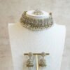 Three piece adjustable sparkling stone choker necklace set with matching earrings and a maang tikka with hanging pearl beads by Seyora Jewels.