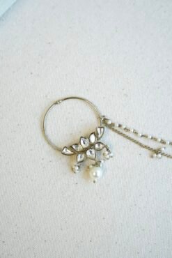 Mehndi polish Kundan nath featuring a lotus design, hanging pearl, and two-layer pearl chain by Seyora Jewels.