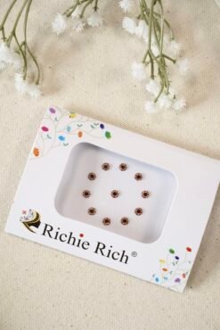 Maroon bindi with glittering crystal stone border and settings.