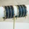 Blue glass bangle stack with delicate ghungroo accent bangles for weddings, mehendi events, and festive wear.