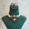 Elegant green beaded choker necklace and matching earrings featuring a lotus Kundan centerpiece by Seyora Jewels.