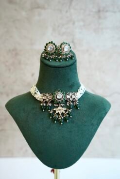 Elegant green beaded choker necklace and matching earrings featuring a lotus Kundan centerpiece by Seyora Jewels.