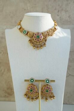 Heritage necklace set with pink green stones and mother of pearl accents in yellow gold finish with matching earrings