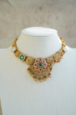 Heritage necklace set with pink green stones and mother of pearl accents in yellow gold finish with matching earrings