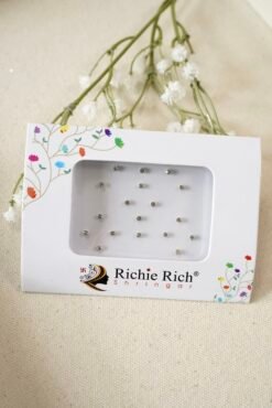 Pack of small silver bindis with glittering crystal stone settings.