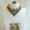 Lightweight green artificial Kundan necklace set with matching drop earrings and Maang Tikka for South Asian weddings.