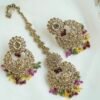 Seyora sparkling festive jewelry set featuring champagne stone earrings with hanging multi-color crystal beads and a matching maang tikka.
