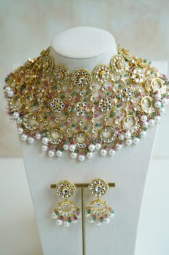 Heavily beaded pastel pachi kundan bridal necklace set with matching earrings.