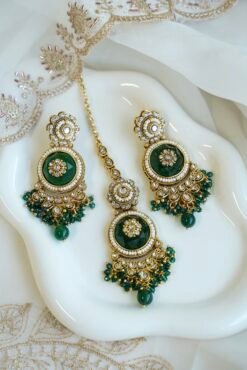 Lightweight green artificial Kundan necklace set with matching drop earrings and Maang Tikka for South Asian weddings.