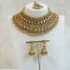 Traditional South Asian gold plated kundan necklace set with matching earrings and maang tikka for Indian, Pakistani, Punjabi, and South Indian brides.