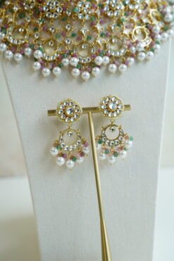 Heavily beaded pastel pachi kundan bridal necklace set with matching earrings.