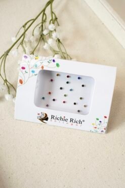 Pack of small multicolor bindis with central stone settings.