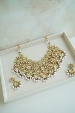 Heavily beaded pastel pachi kundan bridal necklace set with matching earrings.