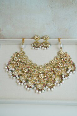 Heavily beaded pastel pachi kundan bridal necklace set with matching earrings.