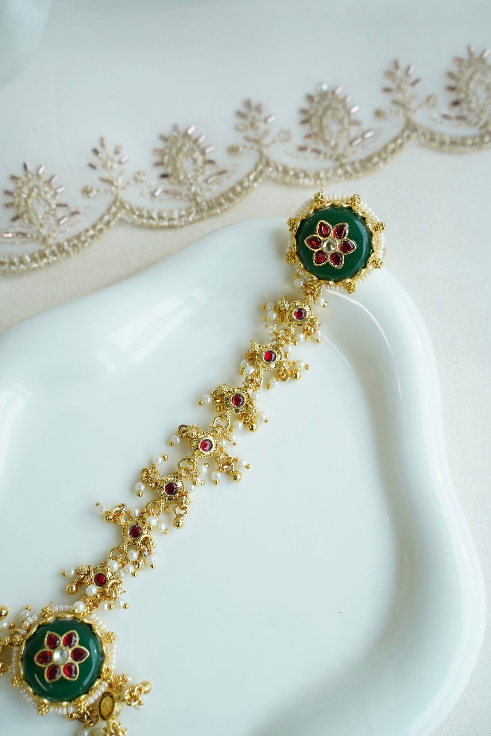 Seyora Jewels traditional hathphool hand chain featuring an adjustable finger ring and connecting chain in a bright gold-plated heritage finish.