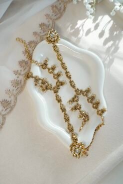 Seyora Jewels Diya floral Kundan hathpan hand chain featuring a kundan-studded flower ring and a detailed connecting chain linked to an adjustable wrist strap.