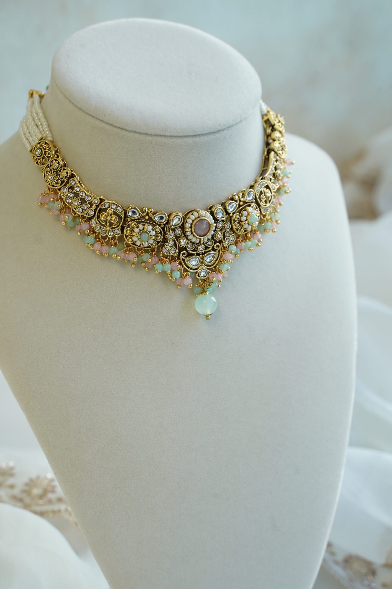 Somya pastel beaded kundan necklace set with matching earrings and tikka - mint and pink South Asian jewelry set