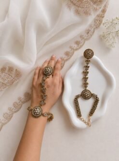 Seyora Jewels Sia traditional floral hathpan hand chain featuring an adjustable flower ring and a structured bracelet-style wrist band.