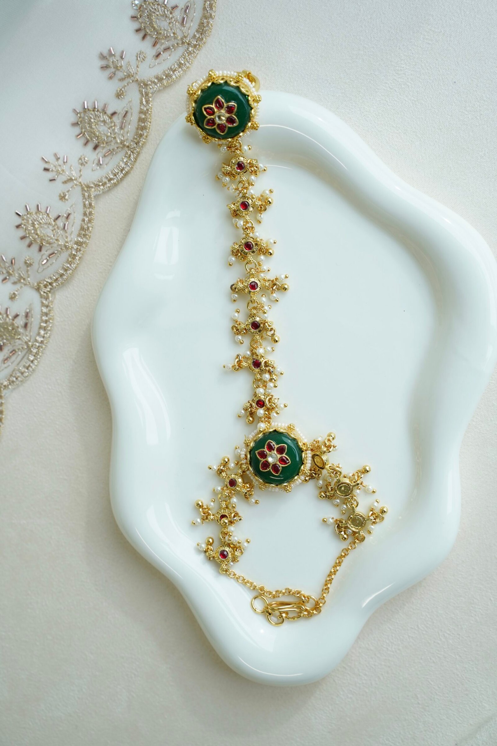 Seyora Jewels traditional hathphool hand chain featuring an adjustable finger ring and connecting chain in a bright gold-plated heritage finish.