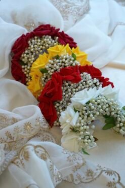 Rose hair bun gajra - traditional floral bun accessory for South Asian weddings and festive occasions